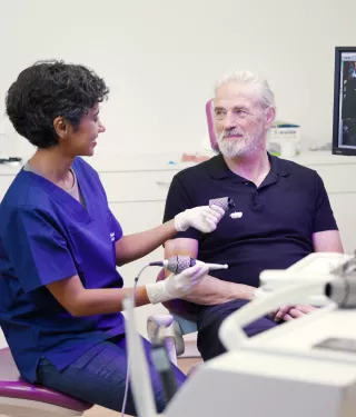 Clinician explaining 3D navigated surgery